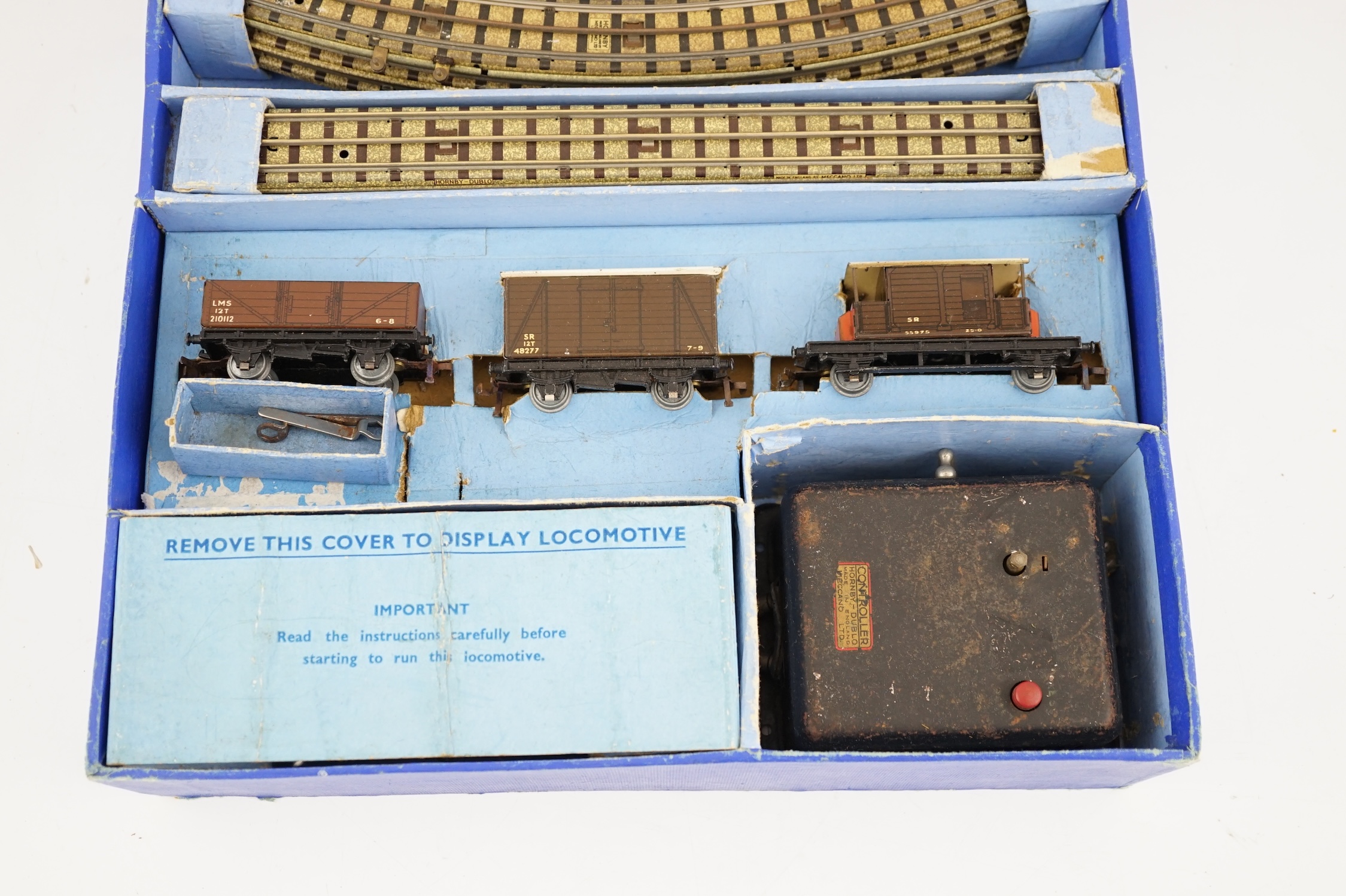 A boxed Hornby Dublo EDG7 Southern Railway Tank Goods Set, comprising of an SR Class N2 0-6-2T locomotive, 2594, for 3-rail running, two Southern freight wagons and an associated LMS open wagon, track sections, etc.